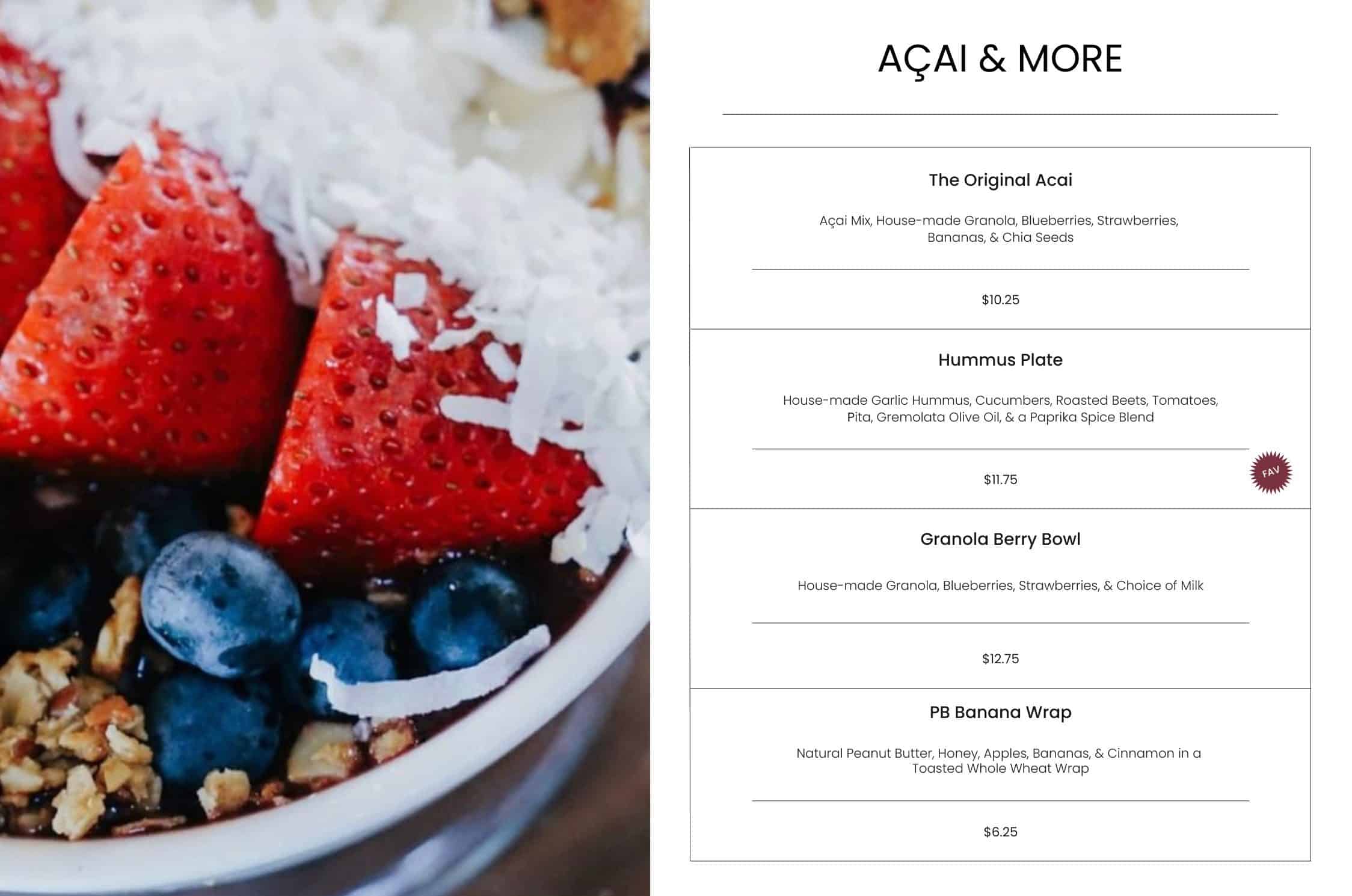 Fresh strawberry and blueberry acai bowl with shredded coconut on top, showing vibrant, fresh berries, healthy ingredients, and colorful presentation perfect for a nutritious breakfast or snack.