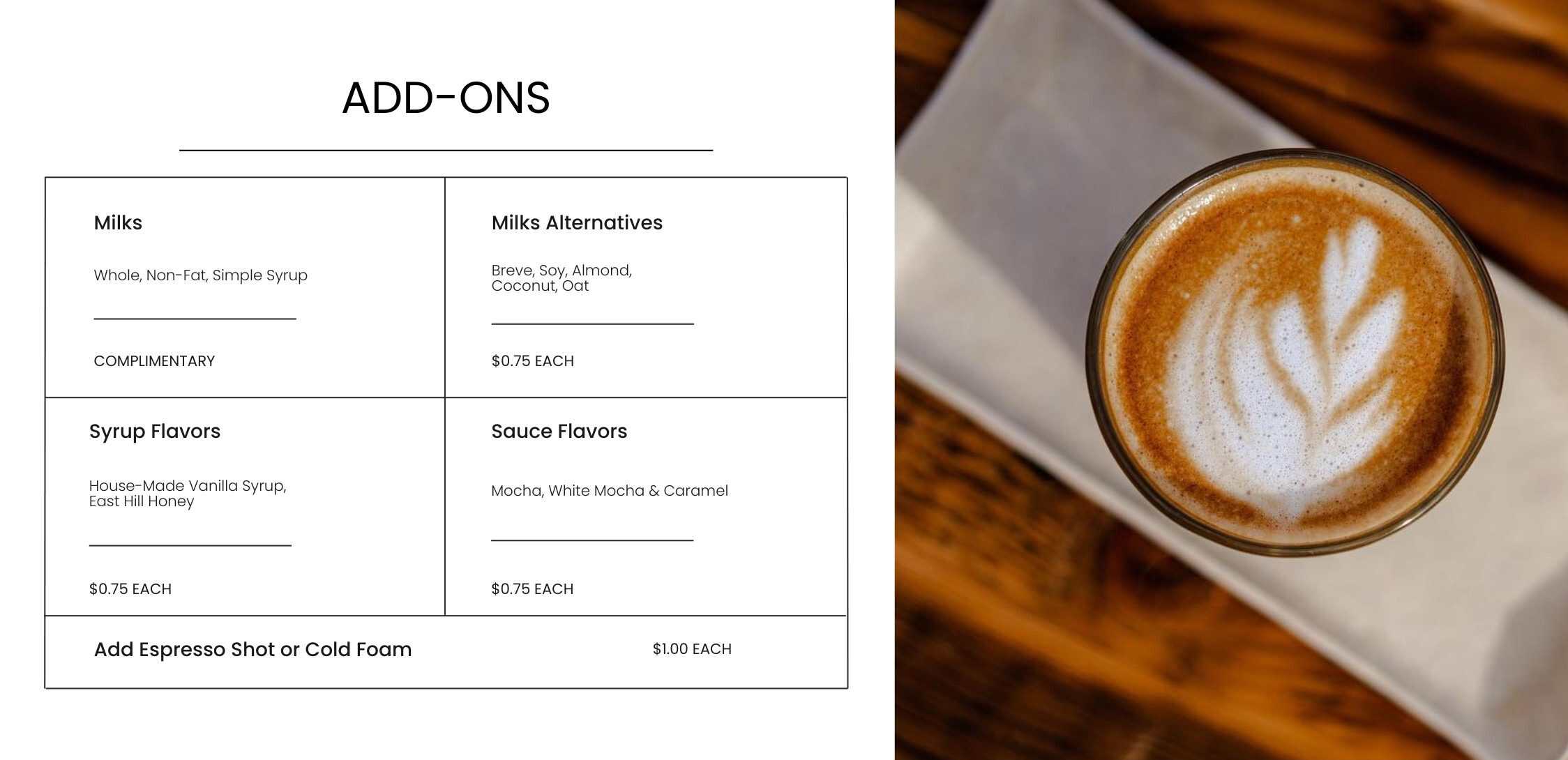 Rich, creamy latte with latte art on top, served in a glass cup on a wooden table at Bodacious Shops, ideal for coffee and cafe lovers seeking high-quality espresso beverages.