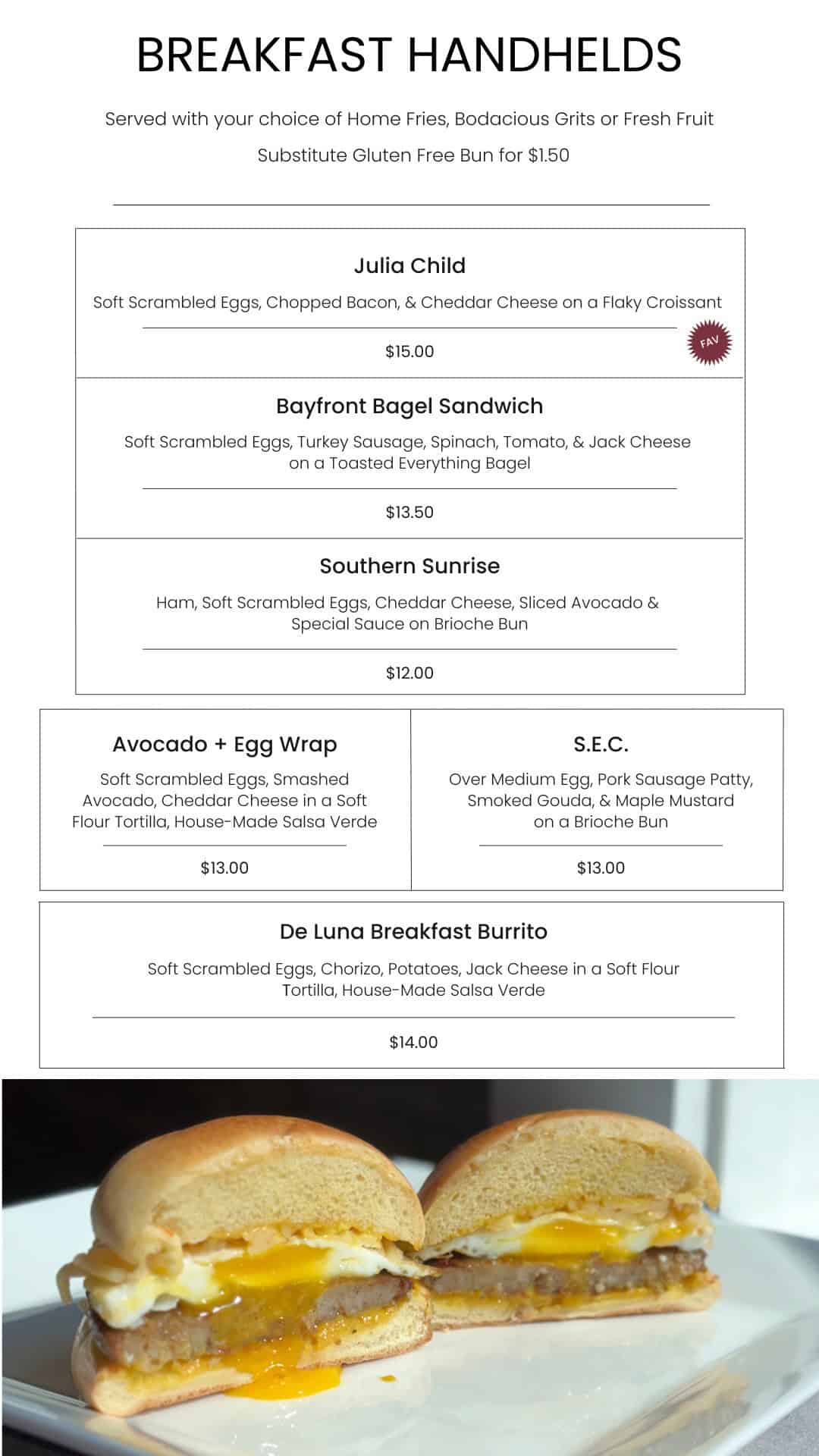 Delicious breakfast sandwich with scrambled eggs, bacon, and cheddar cheese on a flaky croissant at Bodacious Shops.