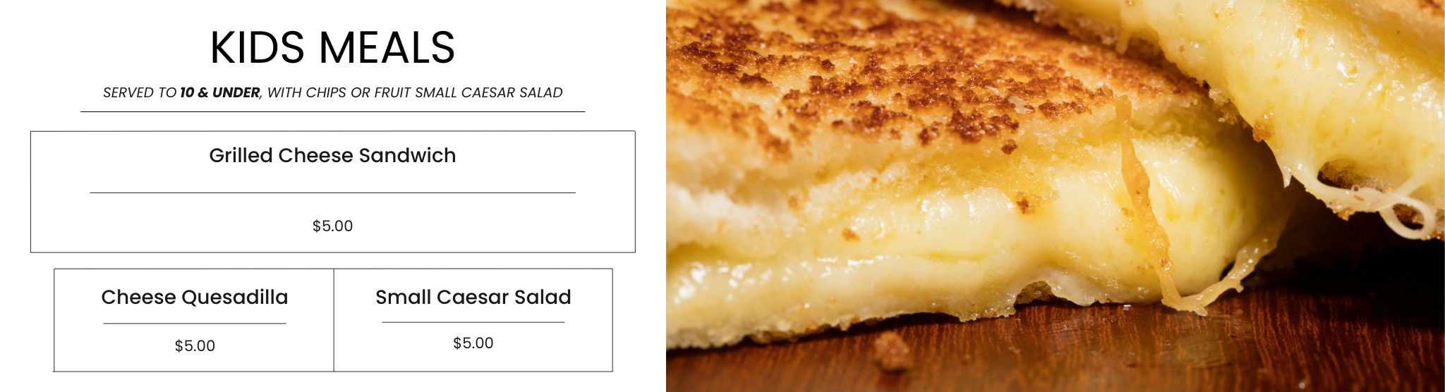 Golden grilled cheese sandwich with melted cheese on toasted bread, close-up image.