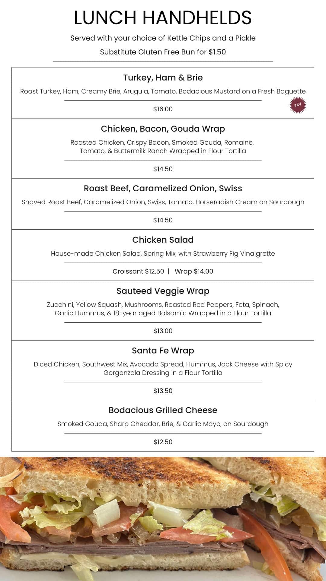 Ally, lunch handhelds at Bodacious Shops, featuring turkey, ham, brie, chicken bacon gouda, roast beef, veggie wraps, and salads for quick, delicious meals.