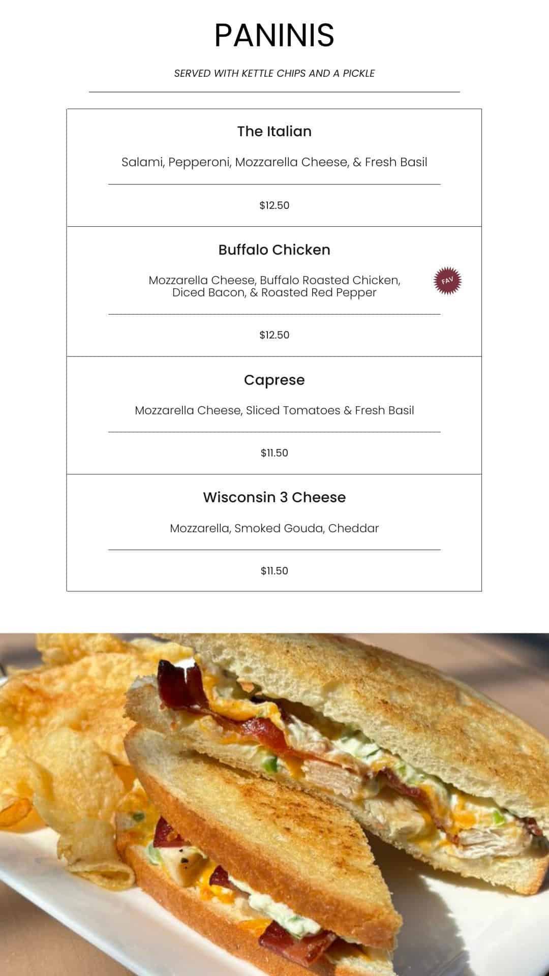 Delicious grilled panini sandwich with bacon, melted cheese, and fresh vegetables served with chips and pickle. Perfect for a flavorful lunch at Bodacious Shops.