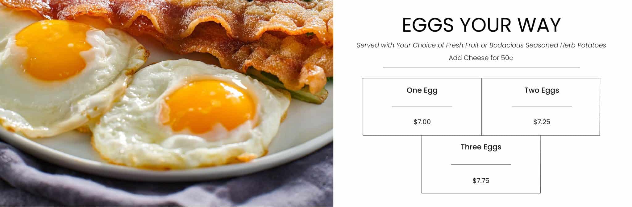 Sunny side up eggs with crispy bacon on a white plate, served with herb potatoes. Perfect breakfast option with fresh fruit and cheese, available at Bodacious Shops.